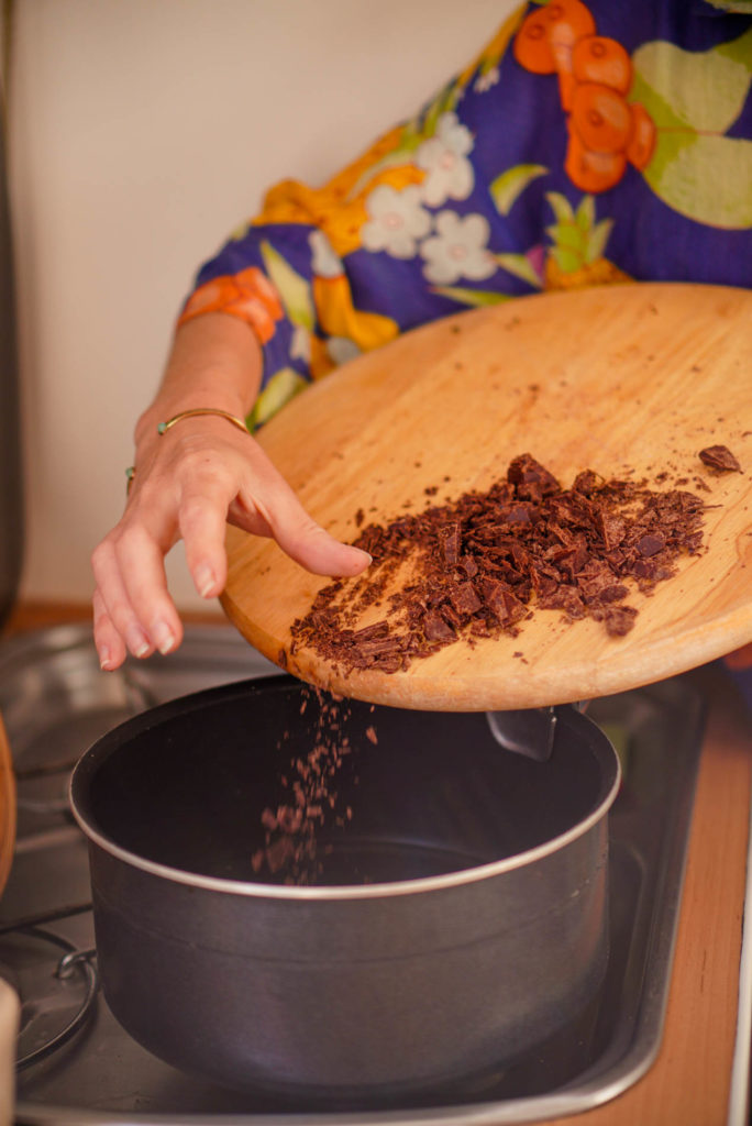 Vai Cacao Lenca throwing cacao in hot water