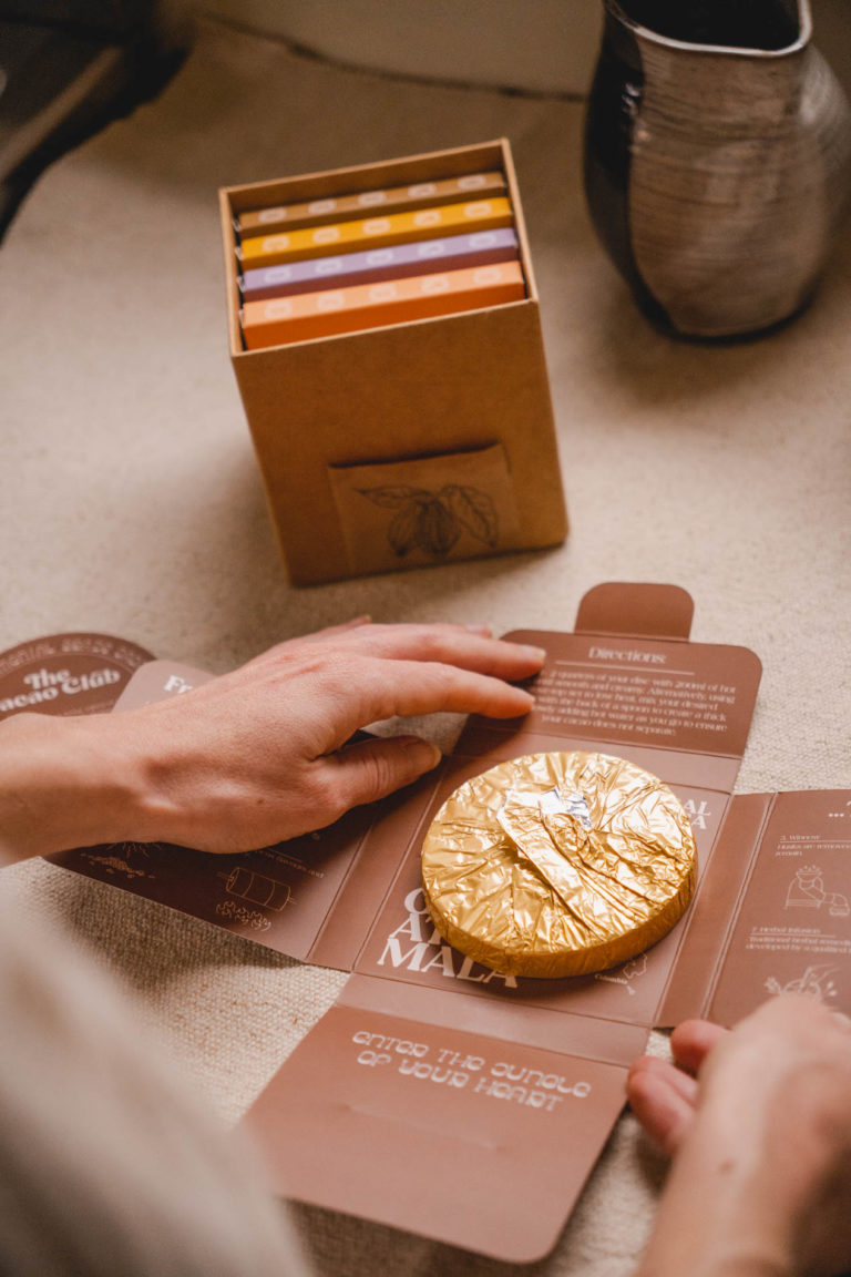 A cacao disc wrapped in golden foil, from The Cacao Club